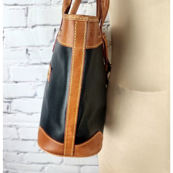 Dooney & Bourke Saffiano Tassel Bucket Tote Bag in black with tan trim - Picture 4 of 16